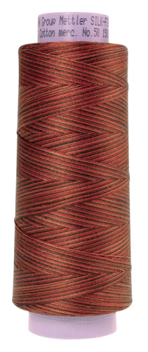 Фото нить для машинного квилтинга silk-finish multi cotton 50 1372 м amann group 9090-9852 на сайте ArtPins.ru