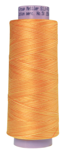 Фото нить для машинного квилтинга silk-finish multi cotton 50 1372 м amann group 9090-9827 на сайте ArtPins.ru