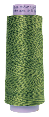 Фото нить для машинного квилтинга silk-finish multi cotton 50 1372 м amann group 9090-9818 на сайте ArtPins.ru