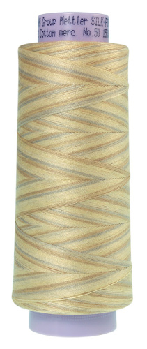 Фото нить для машинного квилтинга silk-finish multi cotton 50 1372 м amann group 9090-9854 на сайте ArtPins.ru