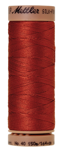 Фото нить для машинного квилтинга silk-finish cotton 40 150м цвет 1074 на сайте ArtPins.ru