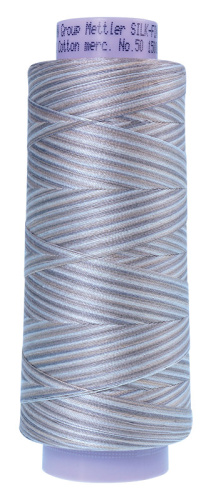 Фото нить для машинного квилтинга silk-finish multi cotton 50 1372 м amann group 9090-9860 на сайте ArtPins.ru